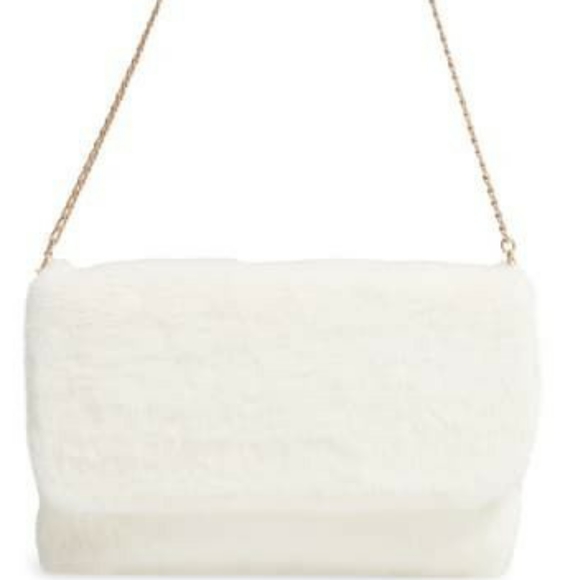 white faux fur bag